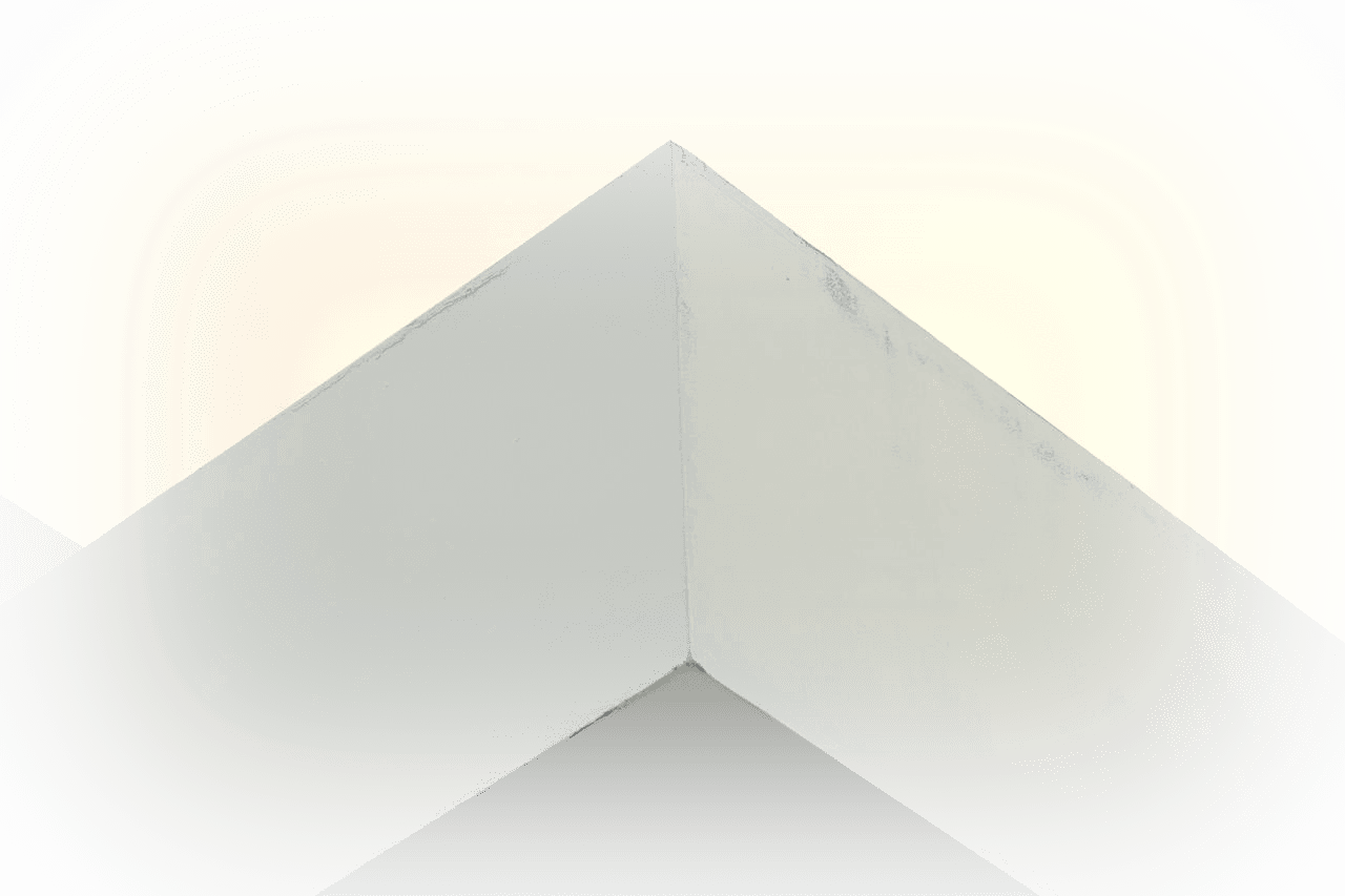 Minimalist building corner against an open sky